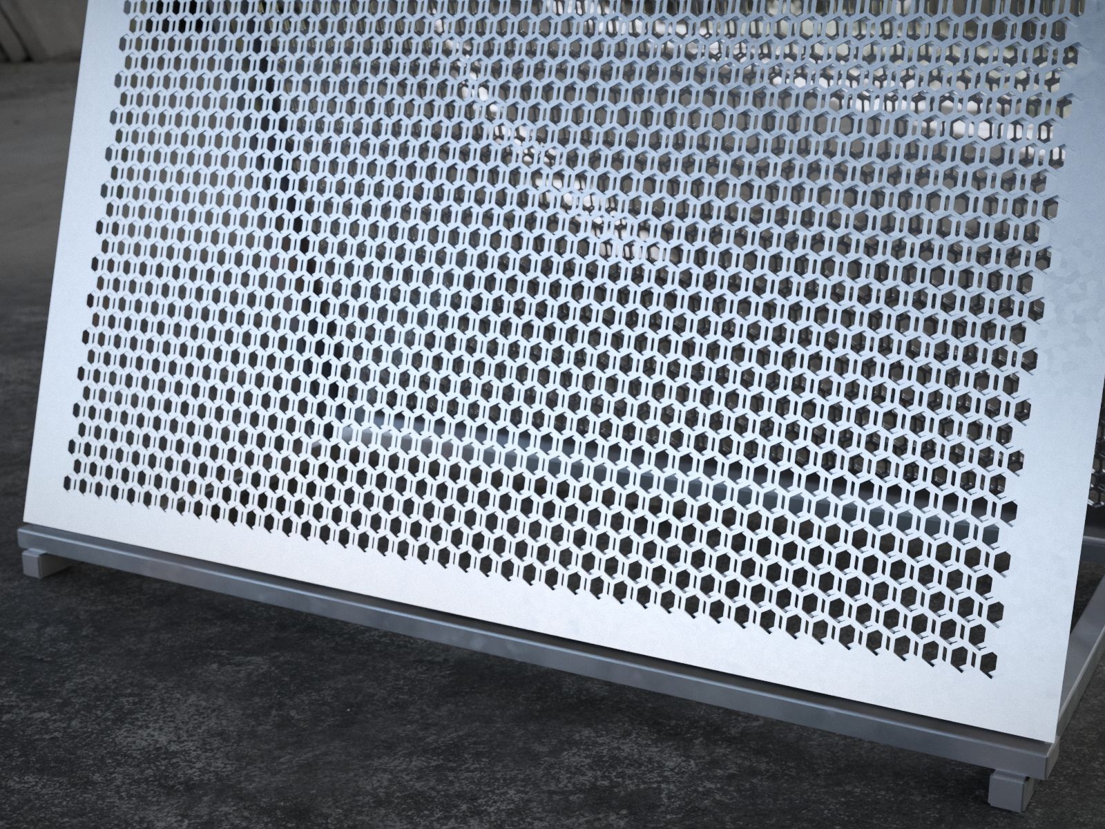Detalle de la perforación hexagonal de un panel de fachada