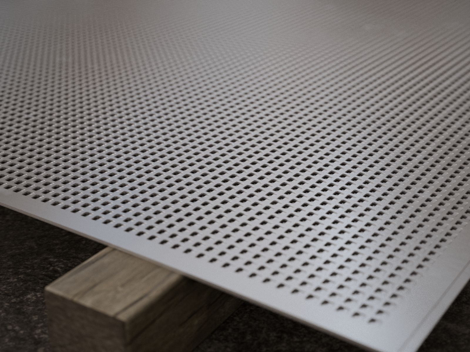Esquina de una plancha con perforación cuadrada