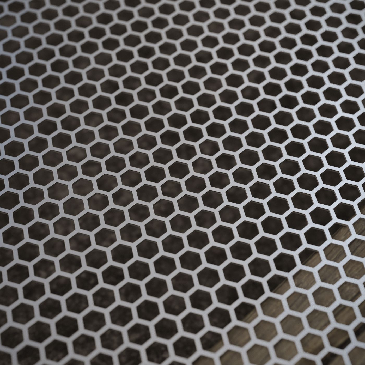 Plancha con perforación hexagonal