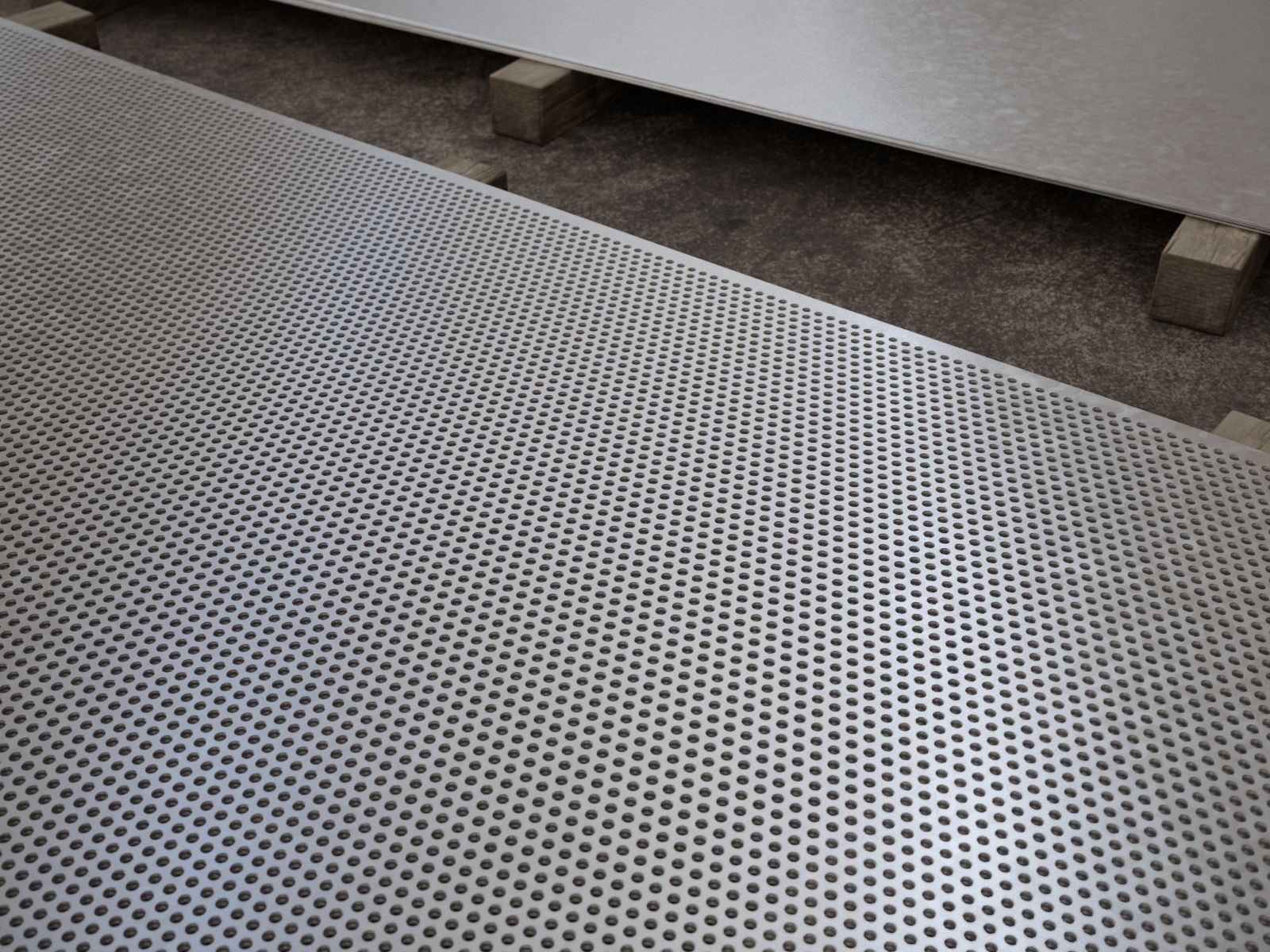 Planchas galvanizadas del cliente junto al lote ya perforado